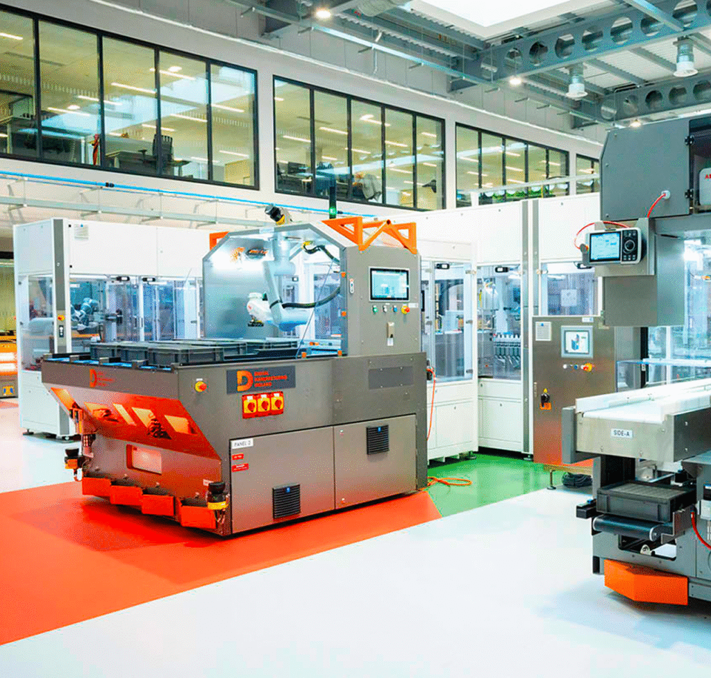 Modern automated factory floor featuring industrial robotics and advanced assembly line machinery